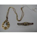 An Edwardian Style Openwork Pendant, circular collet set to the centre, on a chain; together with an