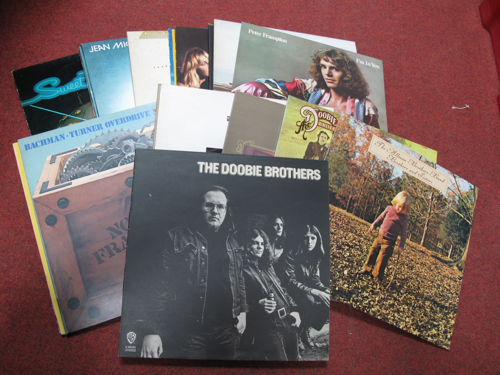 A Collection of Twenty Five LP's, to Include, Doobie Brothers, Allman brothers, Bachman Turner