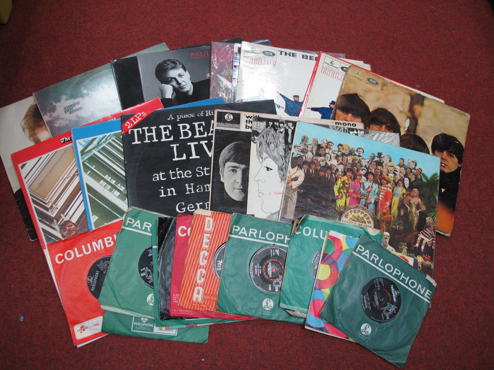 Beatles Interest - a collection to include over ten LP's and 45rpm's - Revolver, Sgt Pepper, Beatles