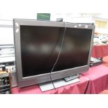 A Sony Bravia 32 Inch Television, with remote.