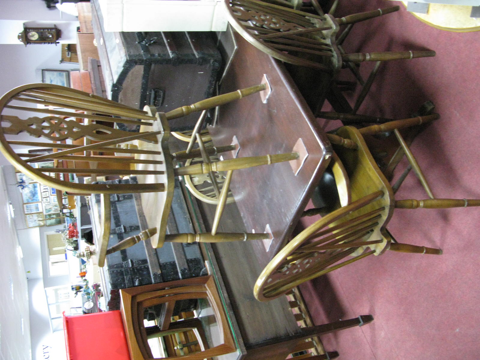 A Refectory Style Table, and (two carvers and four single) wheel back chairs.