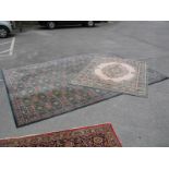 A Belgian 'Pacific' Wool Rug, central oval medallion on a cream field, within spandrels and multi