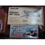 A Battery Operated Thunderbolt Army Fighter by Tomyling, boxed, plus a battery operated 'Savanna'