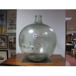 A Glass Carboy.