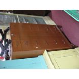 A 1960's/70's Teak Chest of Six Drawers, with gilt metal angular handles, 68.5cm wide.