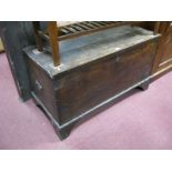A XIX Century Elm Blanket Box, with hinged lid, on bracket feet.
