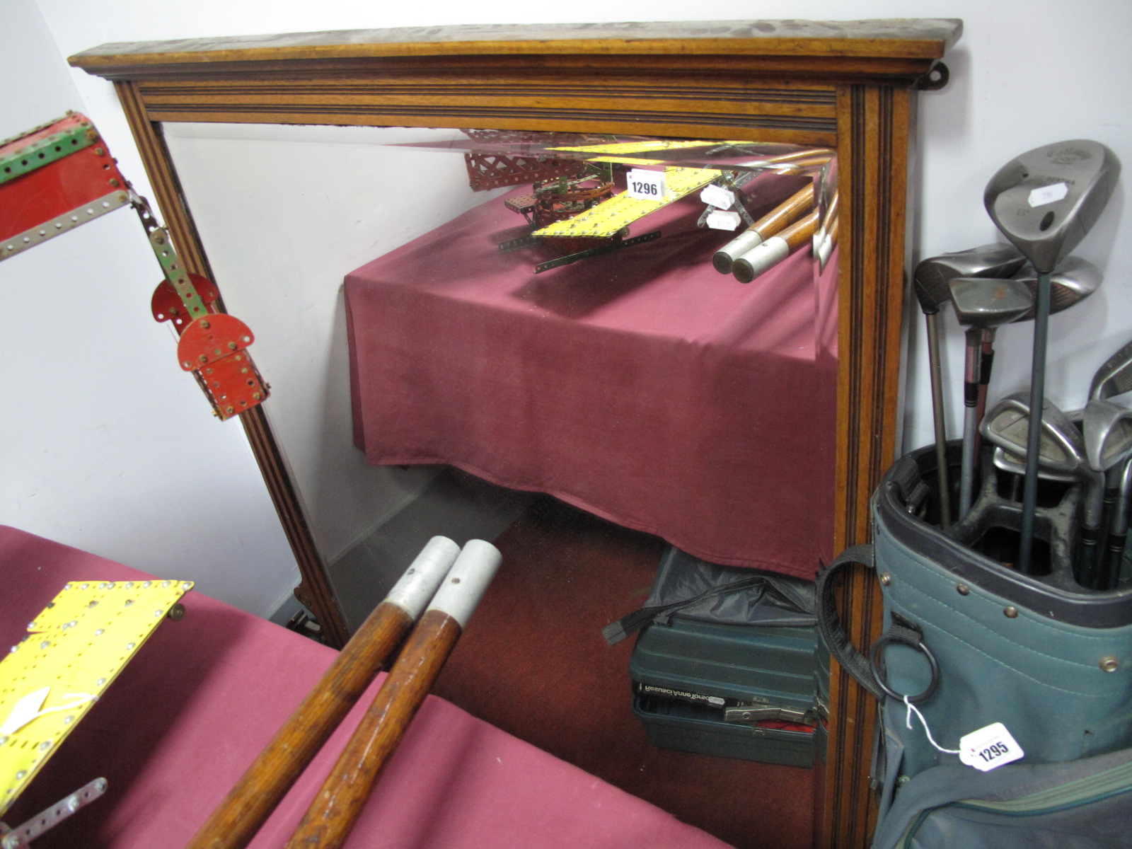 An Edwardian Oak Overmantel, with reeded decoration, bevelled glass.