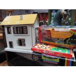 A Dolls House with Furnishings, Sliderama with slides, road crew super dump truck, games. (4)