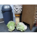 Concave Urn, pottery stand, two concrete heads.