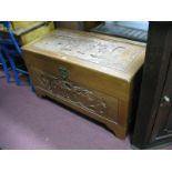 A Camphor Wood Oriental Chest, with carved panels.