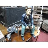 A Model of Scholar on seat, (damaged), golf clubs.