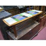 A Teak Coffee Table, with multicoloured ceramic tile inset top, circa 1970's, on tapering legs