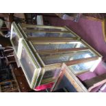A Pair of Gilt Coloured Framed Display Cabinets, with lift up tops and bevelled glazed doors, 47cm