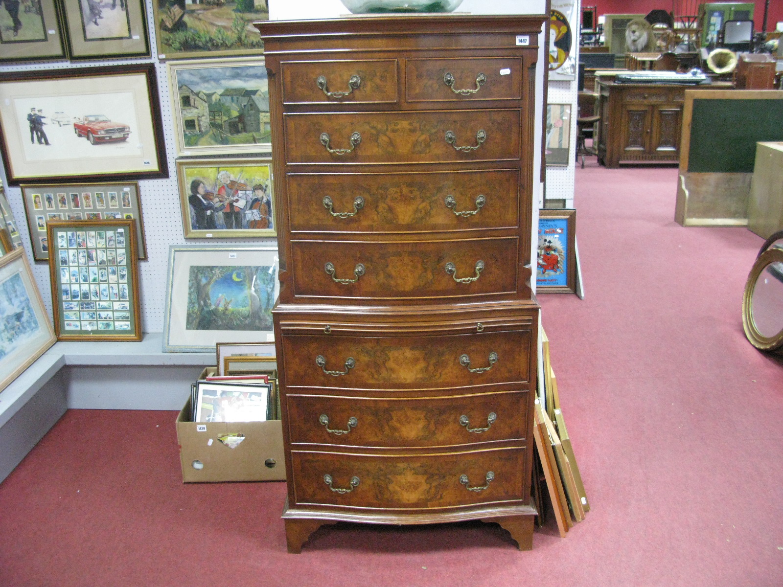 A Reprodux Walnut Serpentine Shaped Chest on Chest, top with two short and three long drawers,