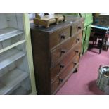 A XIX Century Oak Chest, with turned mahogany handles to two small and three long drawers, on