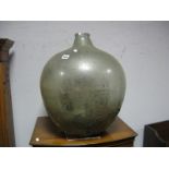 A Glass Carboy.