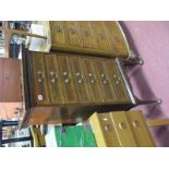 An Edwardian Inlaid Mahogany Music Cabinet, with brass handles to seven fall front drawers, on