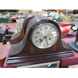 An Early XX Century Mahogany Inlaid Mantel Clock, with domed top, silvered dial, stepped base, on