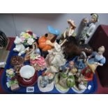 A Beswick Horse, Royal Doulton 'Cisse' (both with damages), china posies, Leonardo figurines, Wade