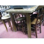 An Oak Dining Table, on reeded legs.