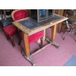 An Oak Library Table, circa early XX Century, with inset scriver to lift up adjustable top, on