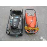 A Hayter Spirit 41 Petrol Lawnmower; together with a Flymo Hover Mower (untested sold for parts