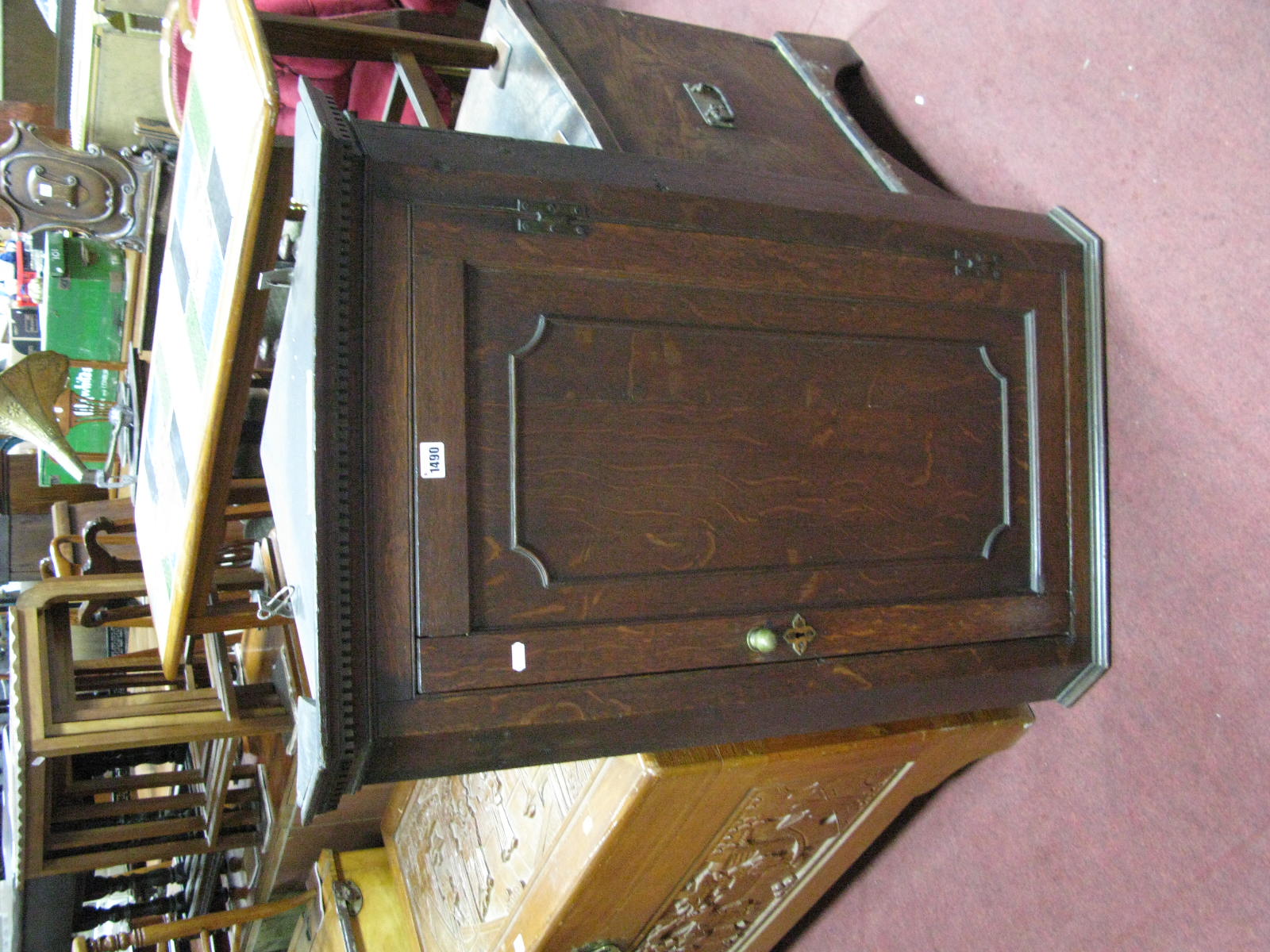 A XIX Century Oak Corner Wall Cupboard, with dentil cornice and shaped inner shelves.