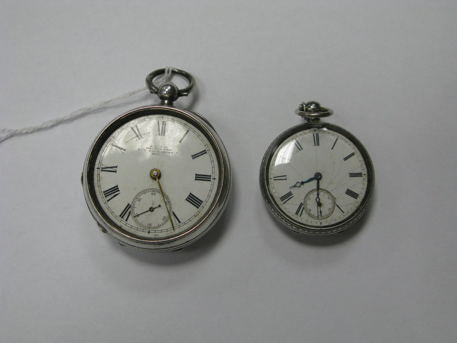 A.W.W.Co Waltham Mass; A hallmarked silver cased open faced pocket watch, the signed dial with black
