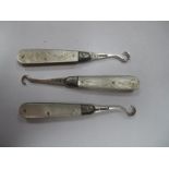 Three Hallmarked Silver and Mother of Pearl Folding Button Hooks, two with engraved detail to