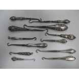 A Collection of Twelve Hallmarked Silver Handled and Other Button Hooks,longest 11.5cm (12)