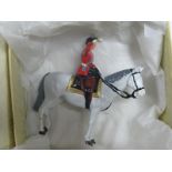 A Mid XX Century Figure of H.M. Queen Elizabeth II as the Colonel In Chief The Grenadier Guards,