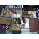 A Family Group of Three Sets of Medals, comprising:- 1) WWI Duo, comprising War and Victory Medals