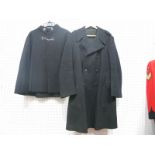 A XX Century Police Cape, with collar badges and chain; a mid XX Century Police Greatcoat, Doncaster