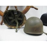 Two WWII and Later U.S. Steel Helmets, both with liners.