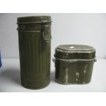 A German WWII Gas Mask Container, (with filters) and a food container dated 1944.