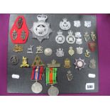 A Small Quantity of Cap and Lapel Badges, often Police related plus a 1916 'On War Service' badge