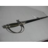 Replica Third Reich S.S Officers Dress Sword, in its black leather scabbard with white metal