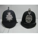 Two ER II Police Helmets, Hull City Police and Leeds City Police.