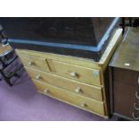 A XIX Century Pine Chest of Drawers, with two short and two long drawers, on bun feet.
