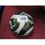 A Mark Mathews Paperweight, of squat globular form, decorated with abstract white swirls on a