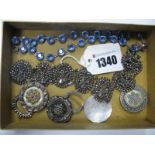 An Antique Cut Steel Bracelet, (damaged), cut steel buttons, a mother of pearl gaming token, a