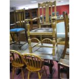 A Set of Four Ash Dining Chairs, with hooped backs, rail supports, on circular legs, 'H' stretchers;