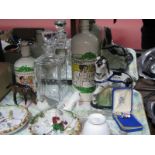 Beswick Grazing Pony, RAC decanter etched with 'Graham Hill 1966', French liquor bottles, wall