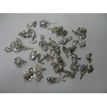 A Collection of Assorted Charm Pendants, including anchor, keys, elephants etc.