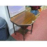 An Edwardian Walnut Octagonal Shaped Table on turned legs, with under shelf.