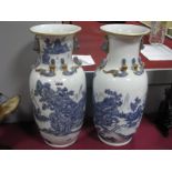 A Pair of Chinese Blue and White Pottery Vases, featuring mountain landscapes, applied gilt