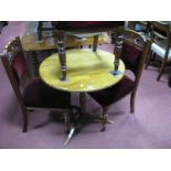 An Oak Pedestal Table, with a circular top, turned pedestal trefoil base.