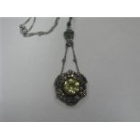 A c..Early XX Century Colourless Paste Set Pendant, (closed back setting) of stylised design on