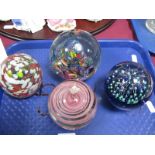 A Studio 'Fish Bowl' Paperweight, with multicoloured 'rock' inclusion and six fish, with three