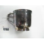 A Hallmarked Silver Mug, (marks rubbed) of plain cylindrical form, with reeded rim.